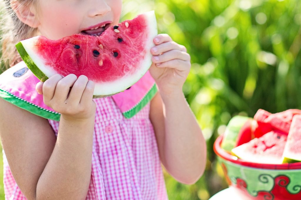 Girl Eating Sliced Watermelon Fruit 